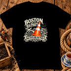A black t-shirt features a graphic with a traffic cone, ship, and text reading Boston Tea Party and Nae Scotland, Nae Party.