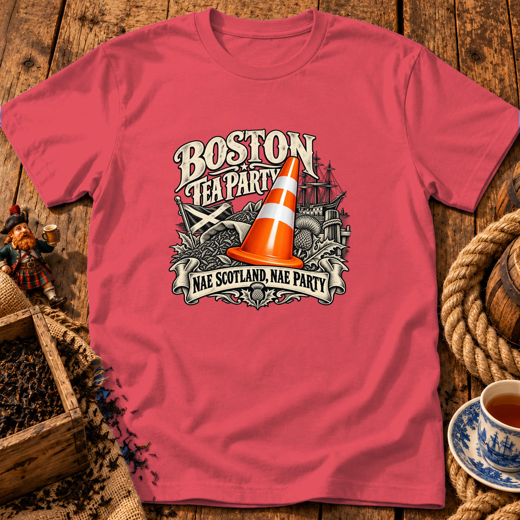 A coral pink crewneck t-shirt featuring a Boston Tea Party graphic with a Scottish traffic cone.