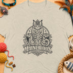 T-shirt with a regal Maine Coon cat graphic and text "MAINE COON WHISKERS & ATTITUDE".