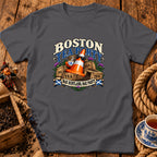 A dark gray t-shirt featuring a humorous graphic of a traffic cone drinking tea amidst crates labeled tea, with the text Boston Tea Party and Nae Scotland, Nae Party.
