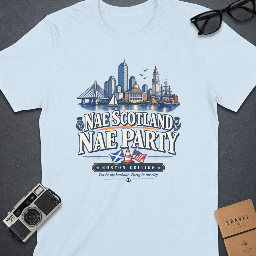 Light blue t-shirt with "Nae Scotland Nae Party Boston Edition" text and city skyline design.