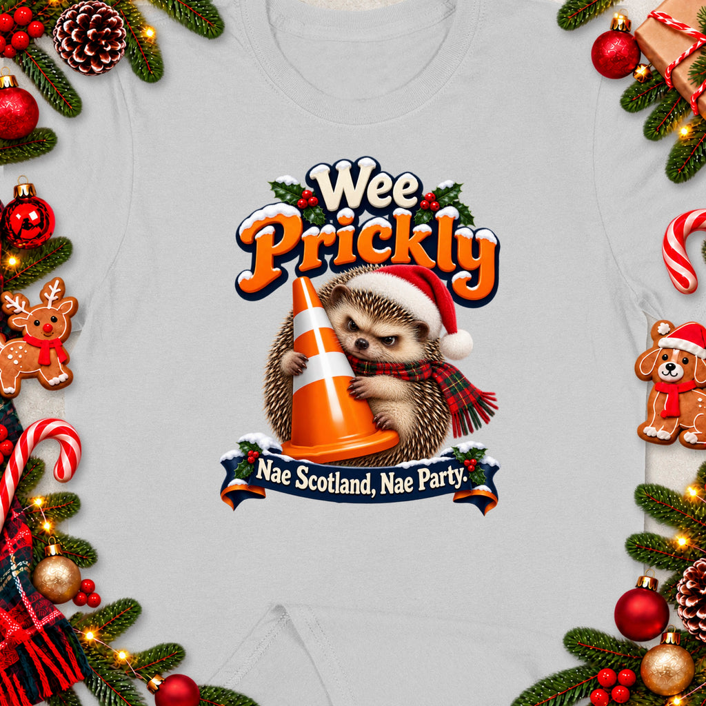Hedgehog in Santa hat holding traffic cone, text "Wee Prickly. Nae Scotland, Nae Party."