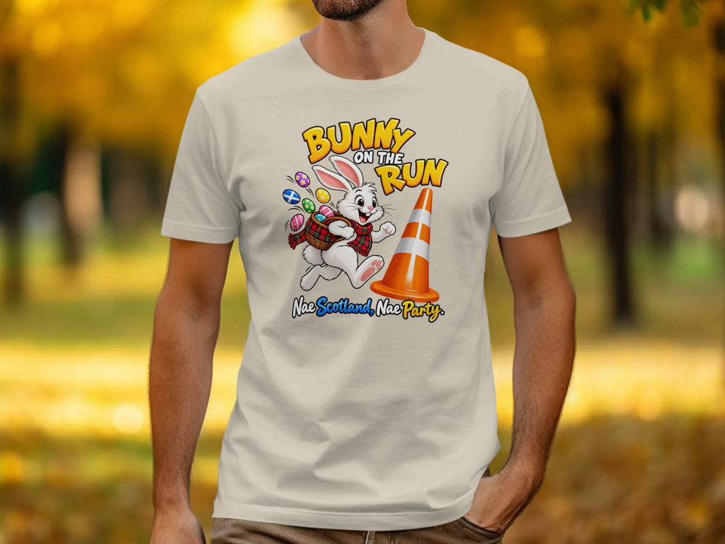 T-shirt with cartoon bunny running with Easter eggs and text "Bunny on the Run".
