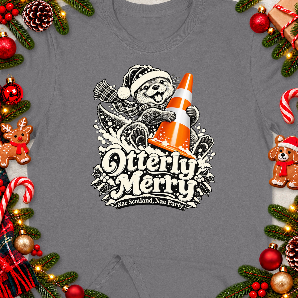 Otterly Merry graphic with otter holding traffic cone on a t-shirt.
