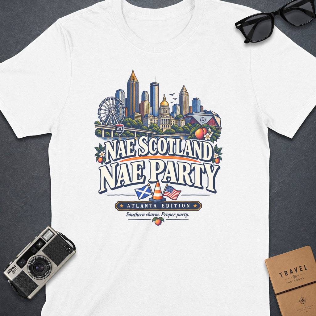 White t-shirt with "Nae Scotland Nae Party Atlanta Edition" text and Atlanta skyline graphic.