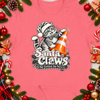 T-shirt with Santa Claws cat graphic and plaid ribbon saying "Nae Scotland, Nae Party."