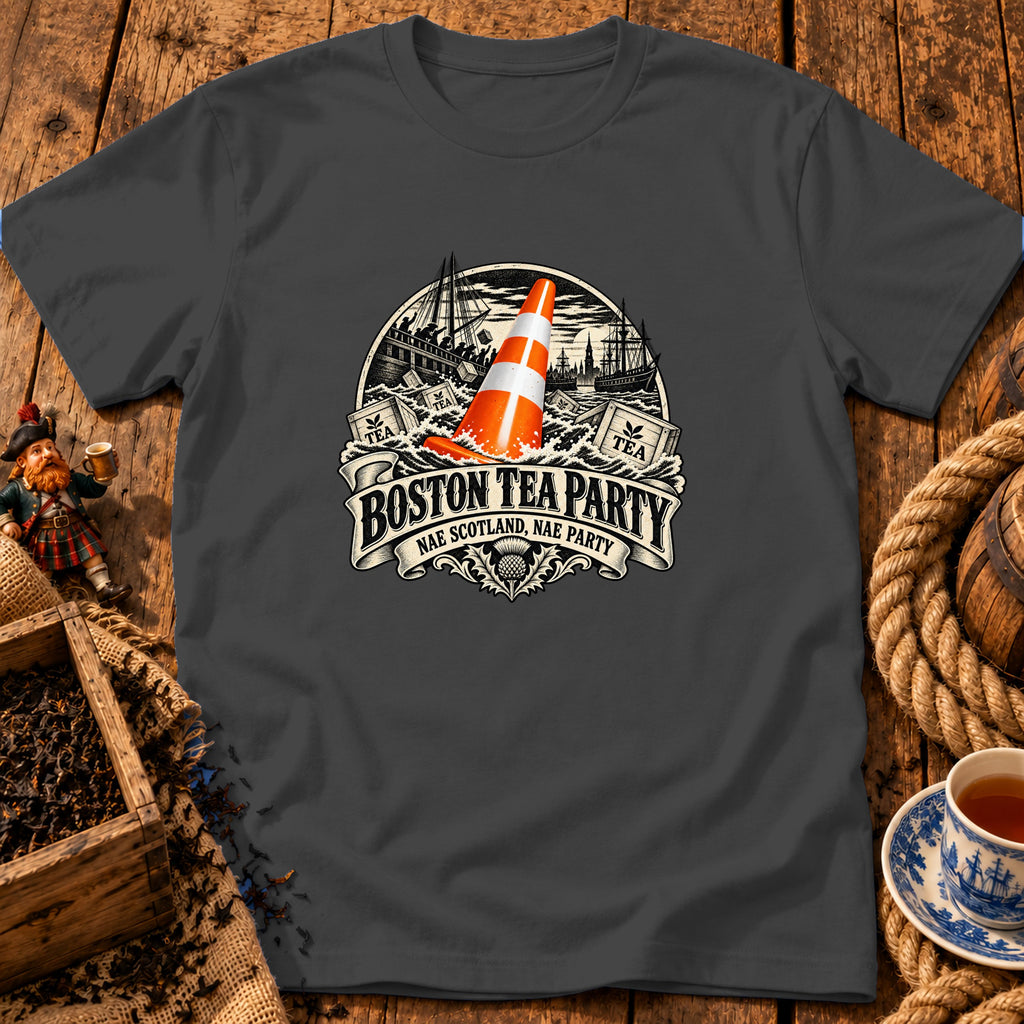 A dark gray crewneck t-shirt featuring a graphic print of a traffic cone amidst a stormy Boston Tea Party scene with text reading BOSTON TEA PARTY NAE SCOTLAND, NAE PARTY.