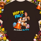 Cartoon bunny holding traffic cone with text "Hop It, Pal! Nae Scotland, Nae Party."