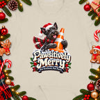 Scottish terrier in Santa hat with traffic cone and "Pawsitively Merry" text.