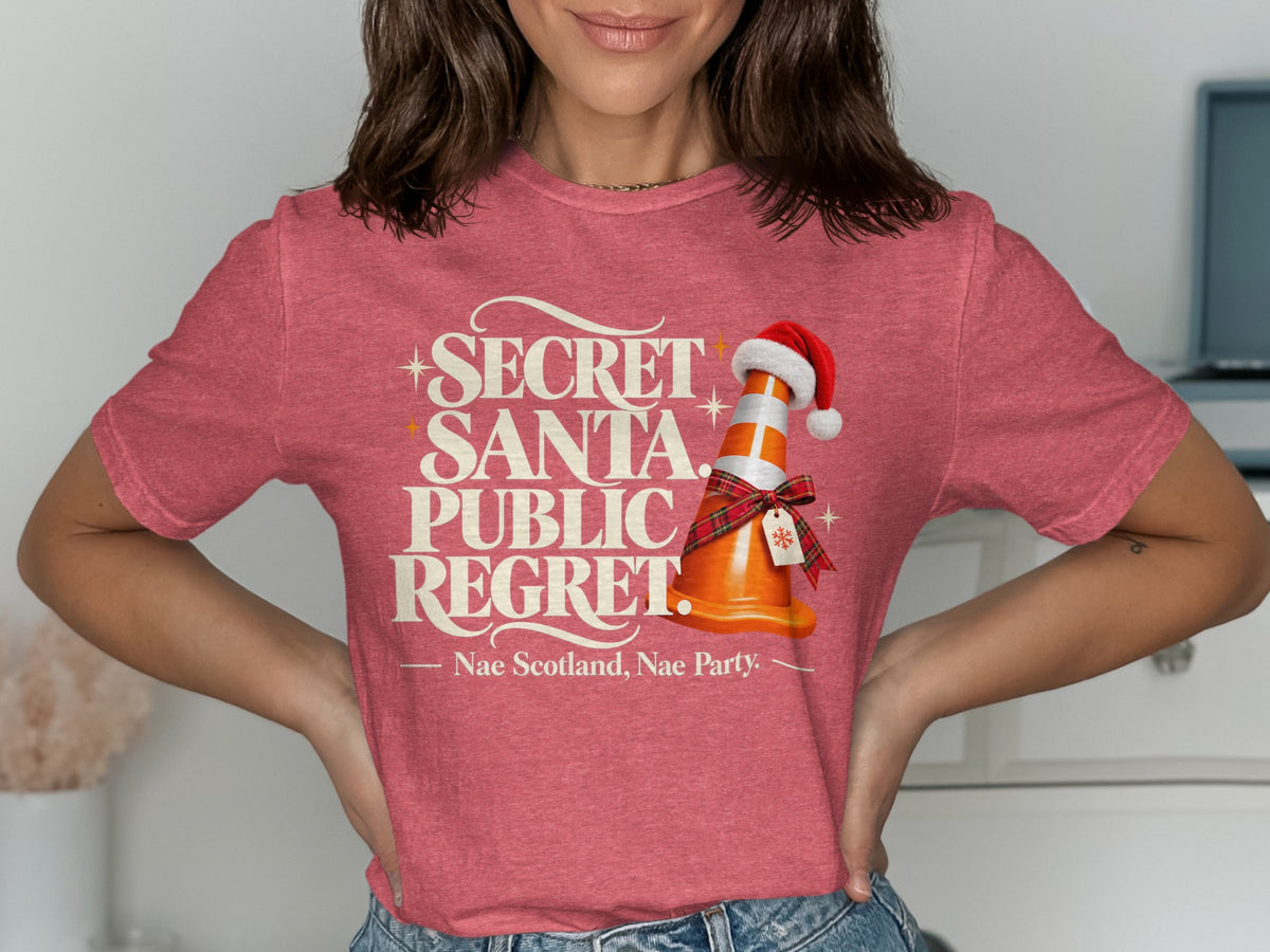 T-shirt with "Secret Santa. Public Regret. Nae Scotland, Nae Party." text and traffic cone.