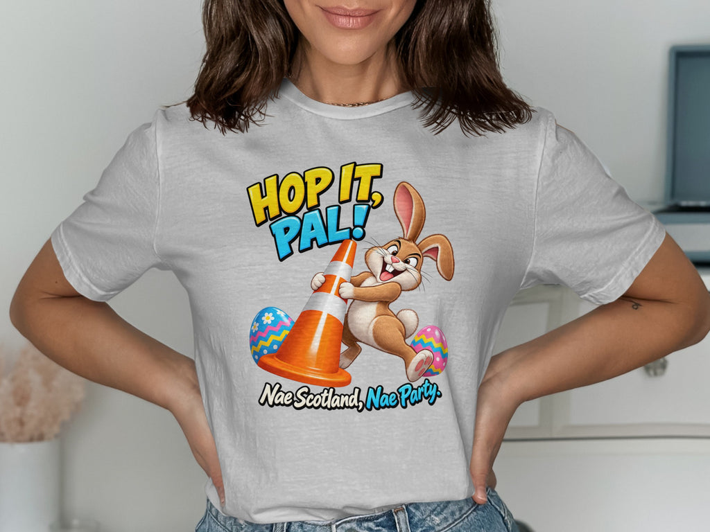 Cartoon bunny hugging traffic cone with Easter eggs and text "Hop it, Pal!"
