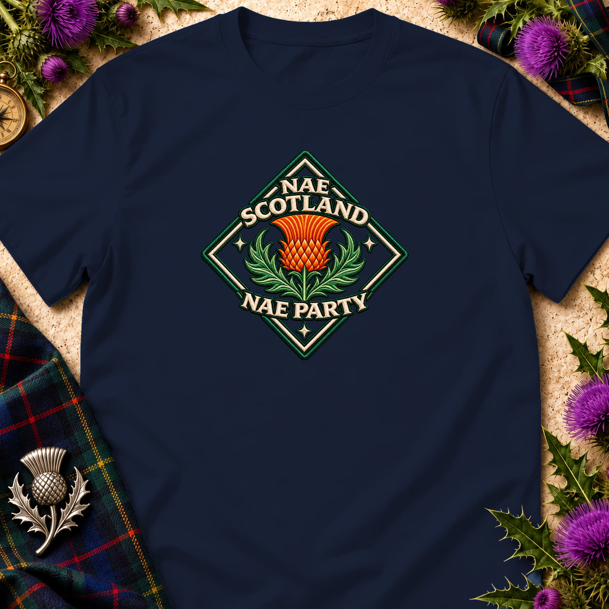 A navy blue t-shirt featuring a diamond-shaped Scottish thistle emblem with the text Nae Scotland Nae Party.