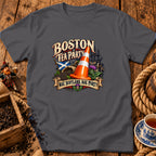 A dark gray t-shirt featuring a Boston Tea Party graphic with a Scottish flag, traffic cone, and text reading "Nae Scotland, Nae Party".